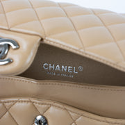Shop this authentic Chanel Dark Beige Lambskin Medium Classic 11.12 Handbag pre-loved on Labellov.com