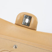 Shop this authentic Chanel Dark Beige Lambskin Medium Classic 11.12 Handbag pre-loved on Labellov.com