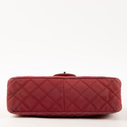 Shop this authentic Chanel Framboise Matte Caviar Maxi 2.55 Reissue Bag Pre-Loved on Labellov.com