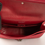 Shop this authentic Chanel Framboise Matte Caviar Maxi 2.55 Reissue Bag Pre-Loved on Labellov.com