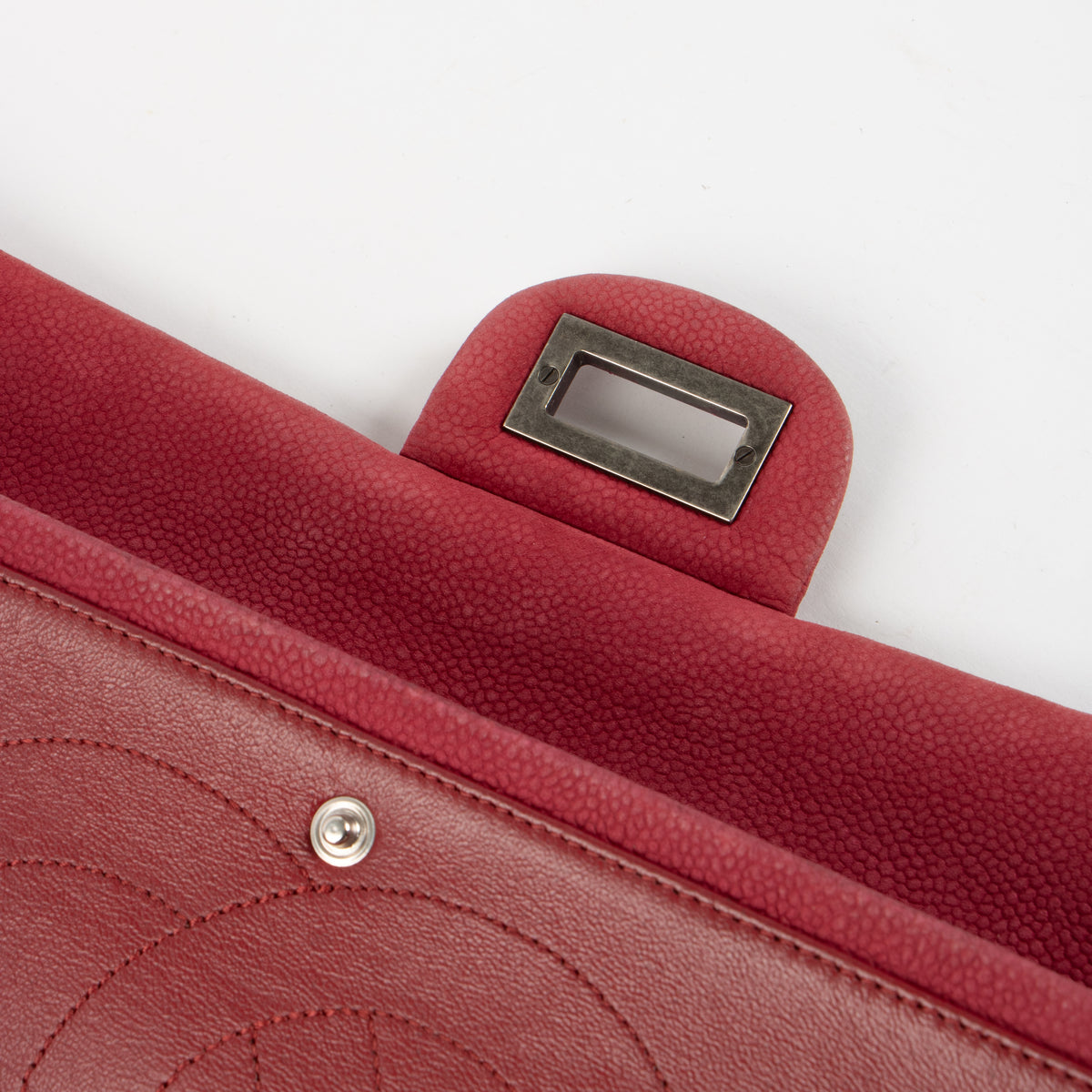 Shop this authentic Chanel Framboise Matte Caviar Maxi 2.55 Reissue Bag Pre-Loved on Labellov.com