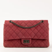 Shop this authentic Chanel Framboise Matte Caviar Maxi 2.55 Reissue Bag Pre-Loved on Labellov.com