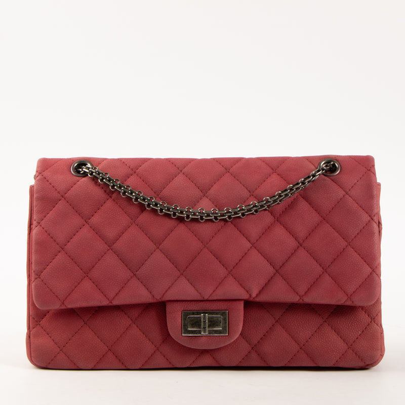 Shop this authentic Chanel Framboise Matte Caviar Maxi 2.55 Reissue Bag Pre-Loved on Labellov.com