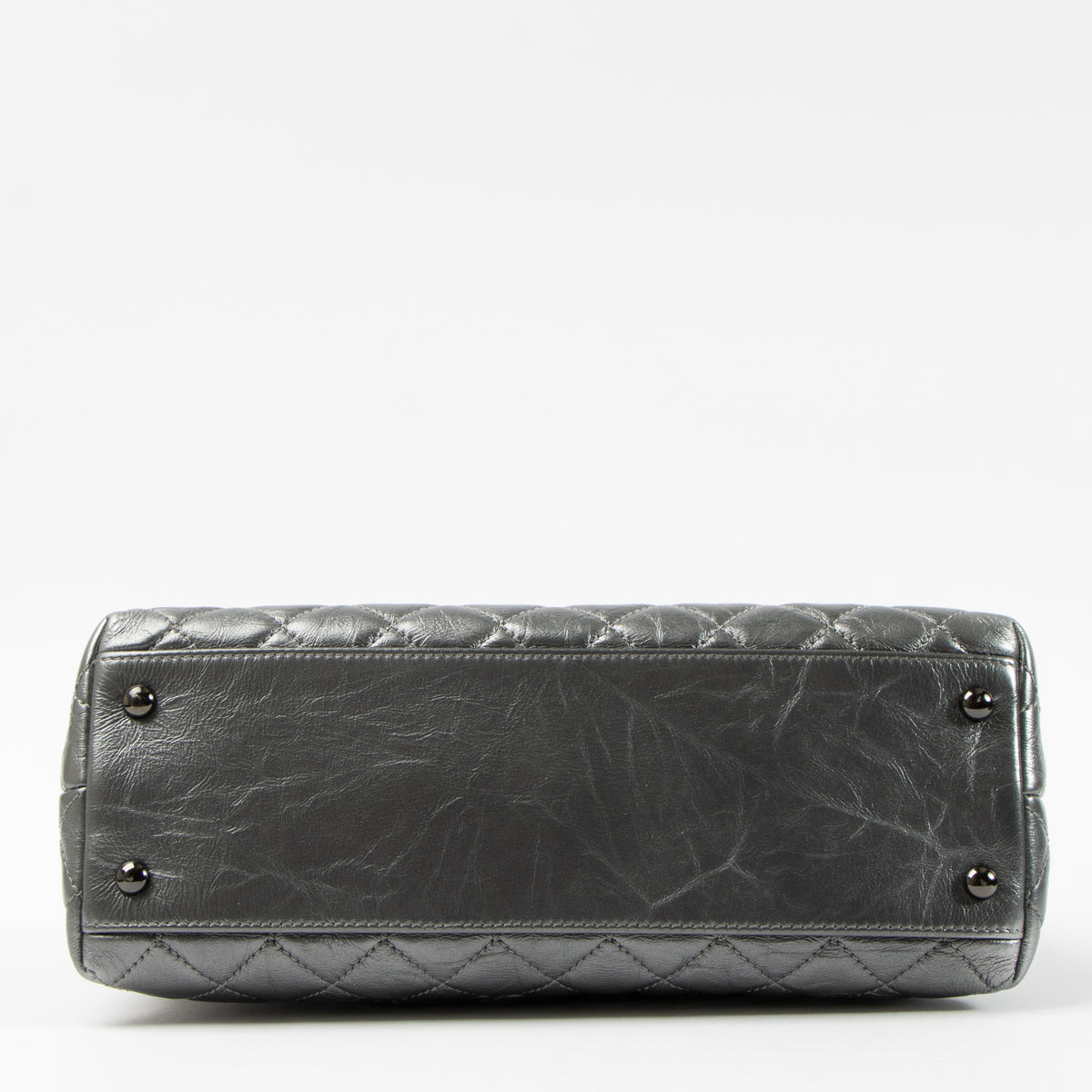 Shop this authentic Chanel Metallic Grey Medium Coco Handle Bag pre-loved on Labellov.com