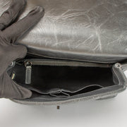 Shop this authentic Chanel Metallic Grey Medium Coco Handle Bag pre-loved on Labellov.com