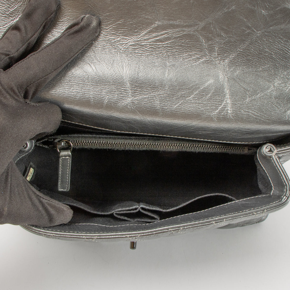 Shop this authentic Chanel Metallic Grey Medium Coco Handle Bag pre-loved on Labellov.com