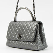 Shop this authentic Chanel Metallic Grey Medium Coco Handle Bag pre-loved on Labellov.com