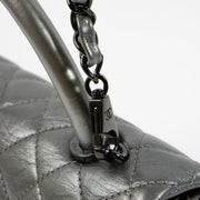 Shop this authentic Chanel Metallic Grey Medium Coco Handle Bag pre-loved on Labellov.com
