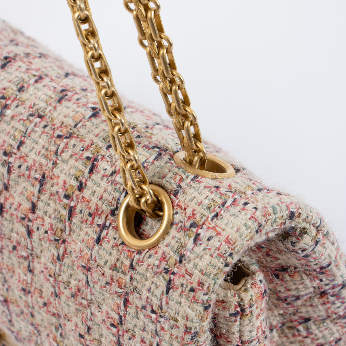 Shop this authentic Chanel Pink Tweed Medium 2.55 Reissue Bag pre-loved on Labellov.com