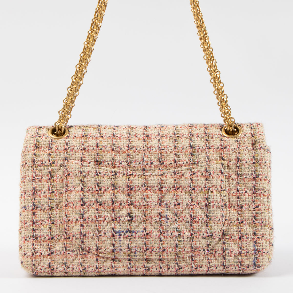 Shop this authentic Chanel Pink Tweed Medium 2.55 Reissue Bag pre-loved on Labellov.com