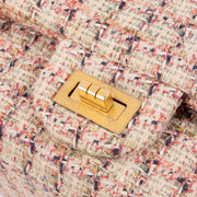 Shop this authentic Chanel Pink Tweed Medium 2.55 Reissue Bag pre-loved on Labellov.com