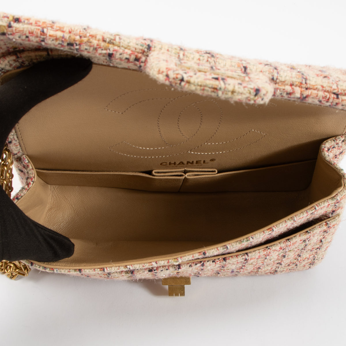 Shop this authentic Chanel Pink Tweed Medium 2.55 Reissue Bag pre-loved on Labellov.com