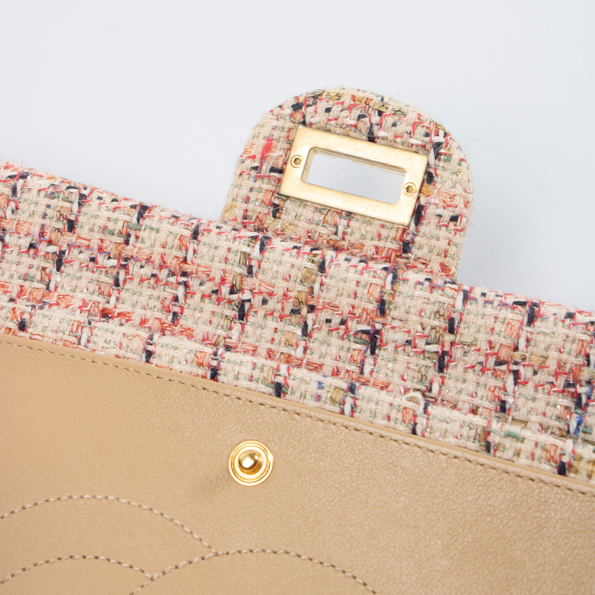 Shop this authentic Chanel Pink Tweed Medium 2.55 Reissue Bag pre-loved on Labellov.com