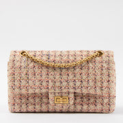Shop this authentic Chanel Pink Tweed Medium 2.55 Reissue Bag pre-loved on Labellov.com