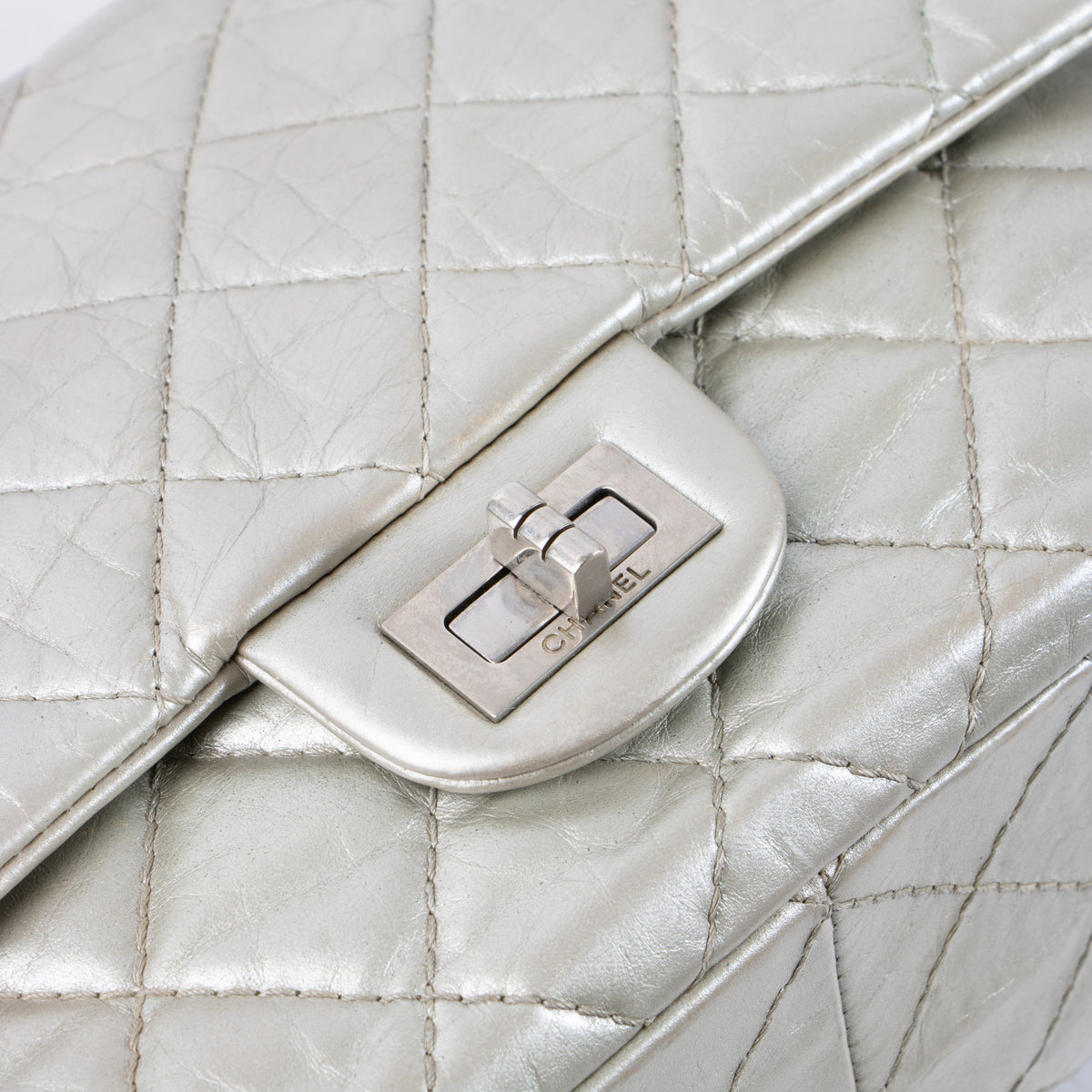 Shop this authentic Chanel Silver Aged Calfskin Large 2.55 Reissue Bag pre-loved on Labellov.com