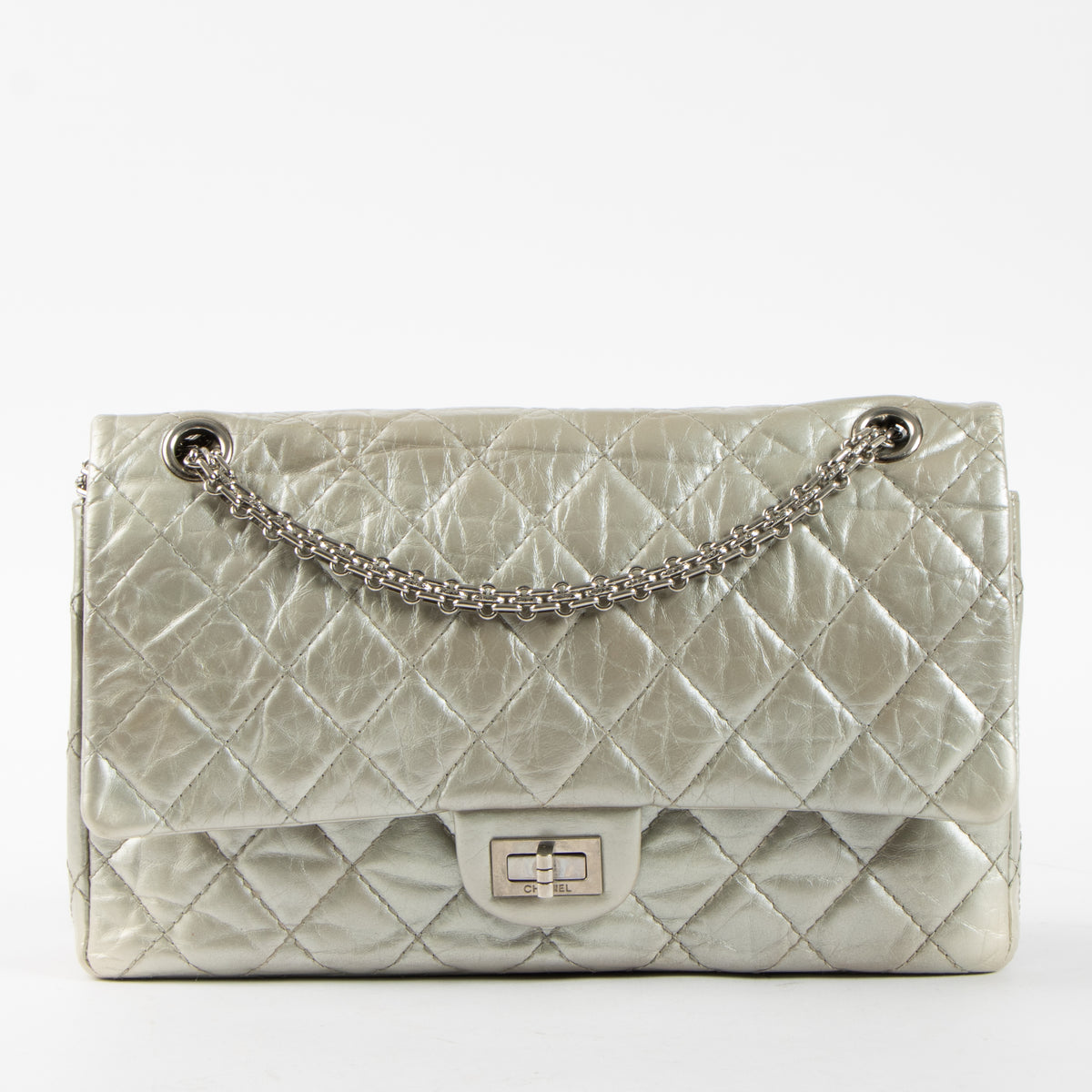 Shop this authentic Chanel Silver Aged Calfskin Large 2.55 Reissue Bag pre-loved on Labellov.com