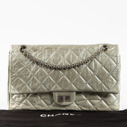 Shop this authentic Chanel Silver Aged Calfskin Large 2.55 Reissue Bag pre-loved on Labellov.com