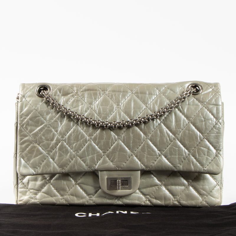 Shop this authentic Chanel Silver Aged Calfskin Large 2.55 Reissue Bag pre-loved on Labellov.com