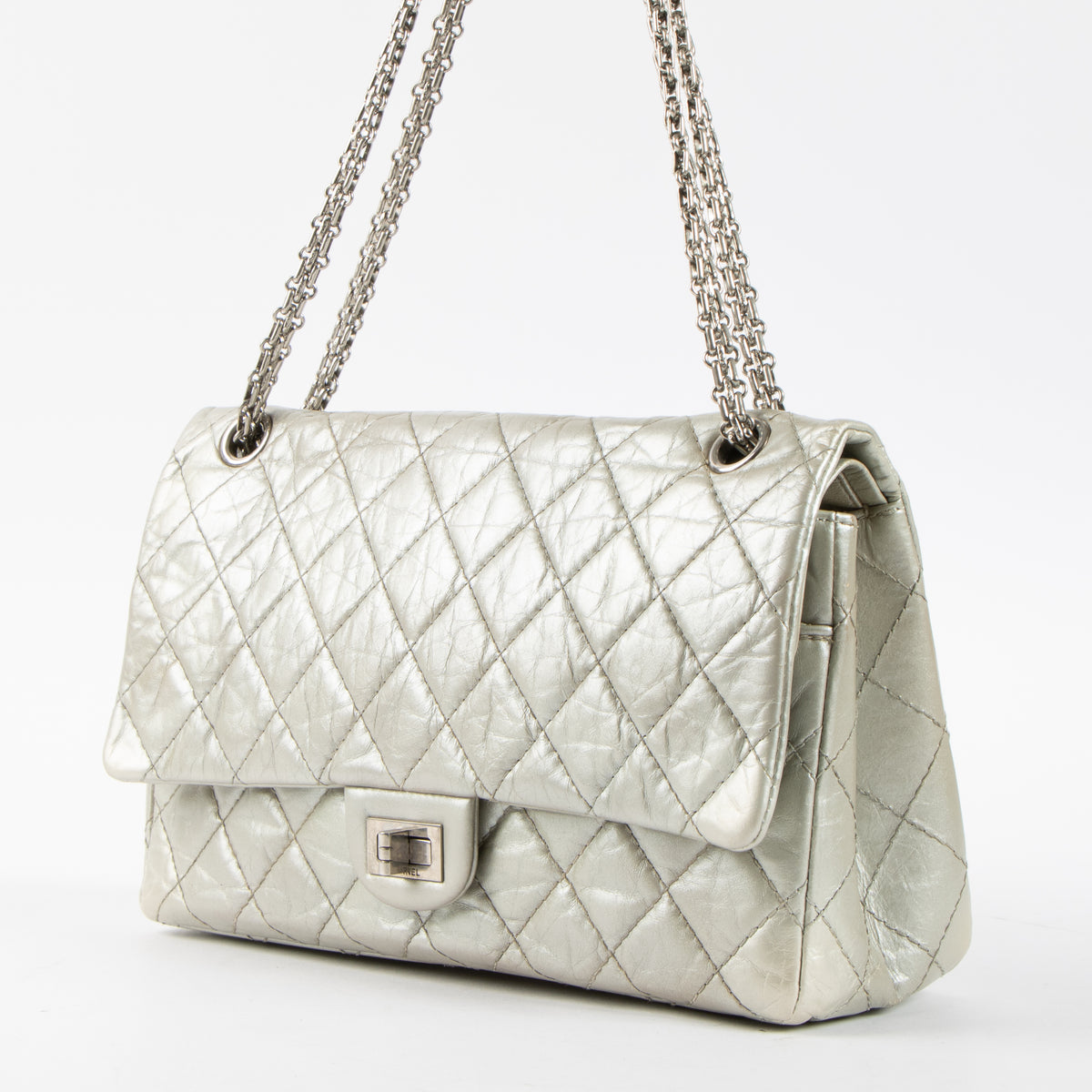 Shop this authentic Chanel Silver Aged Calfskin Large 2.55 Reissue Bag pre-loved on Labellov.com
