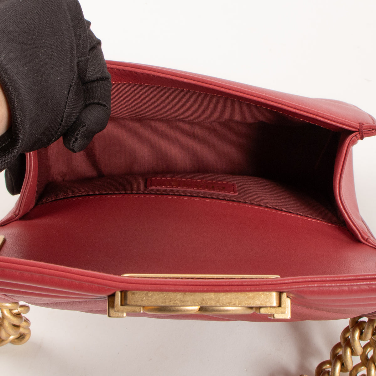 Shop this authentic luxury Chanel Framboise Calfskin Chevron Chanel Boy Small Bag Pre-Loved on Labellov.com