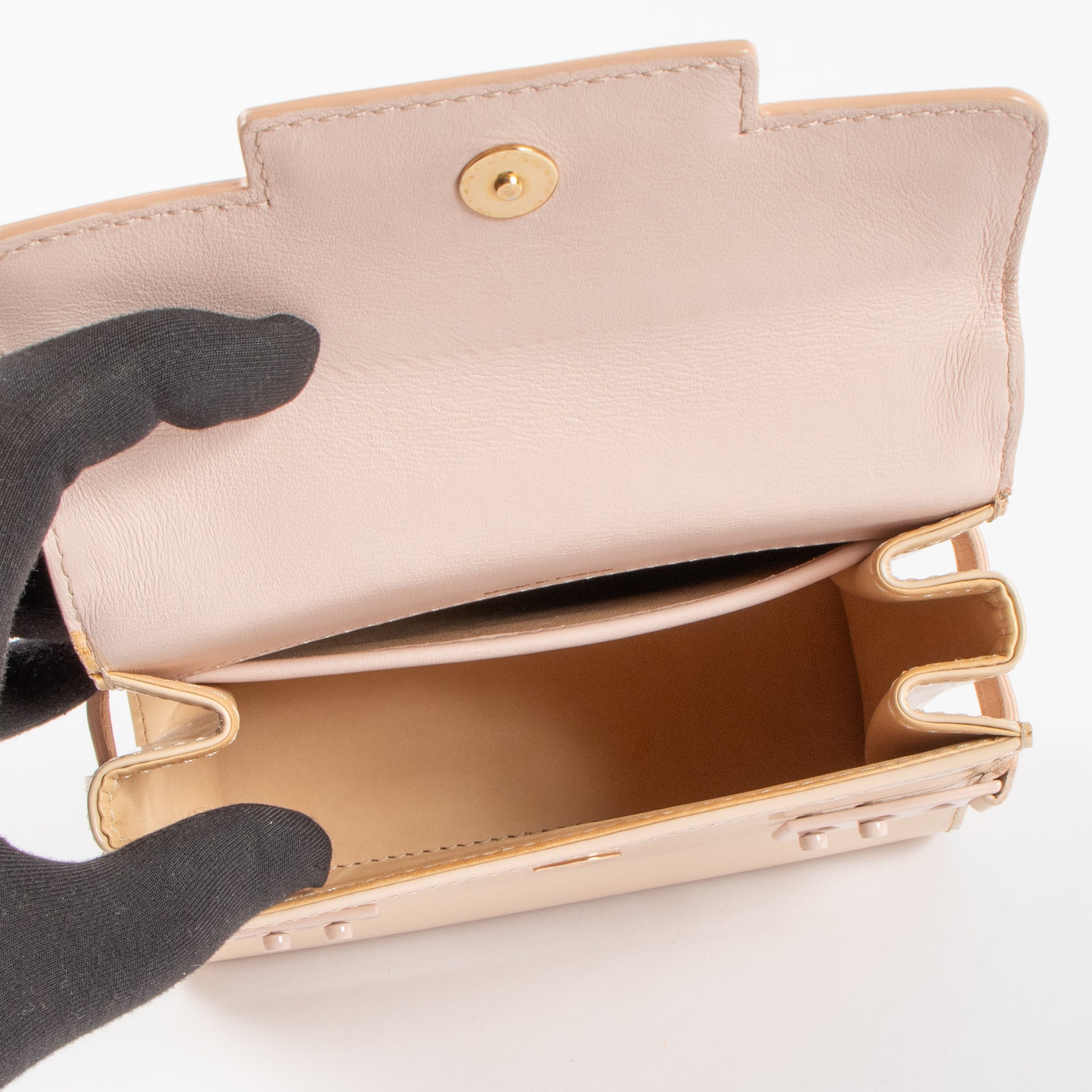 Shop the 100% authentic Delvaux Nude Vernis Tempête Micro Bag second hand on Labellov.com!