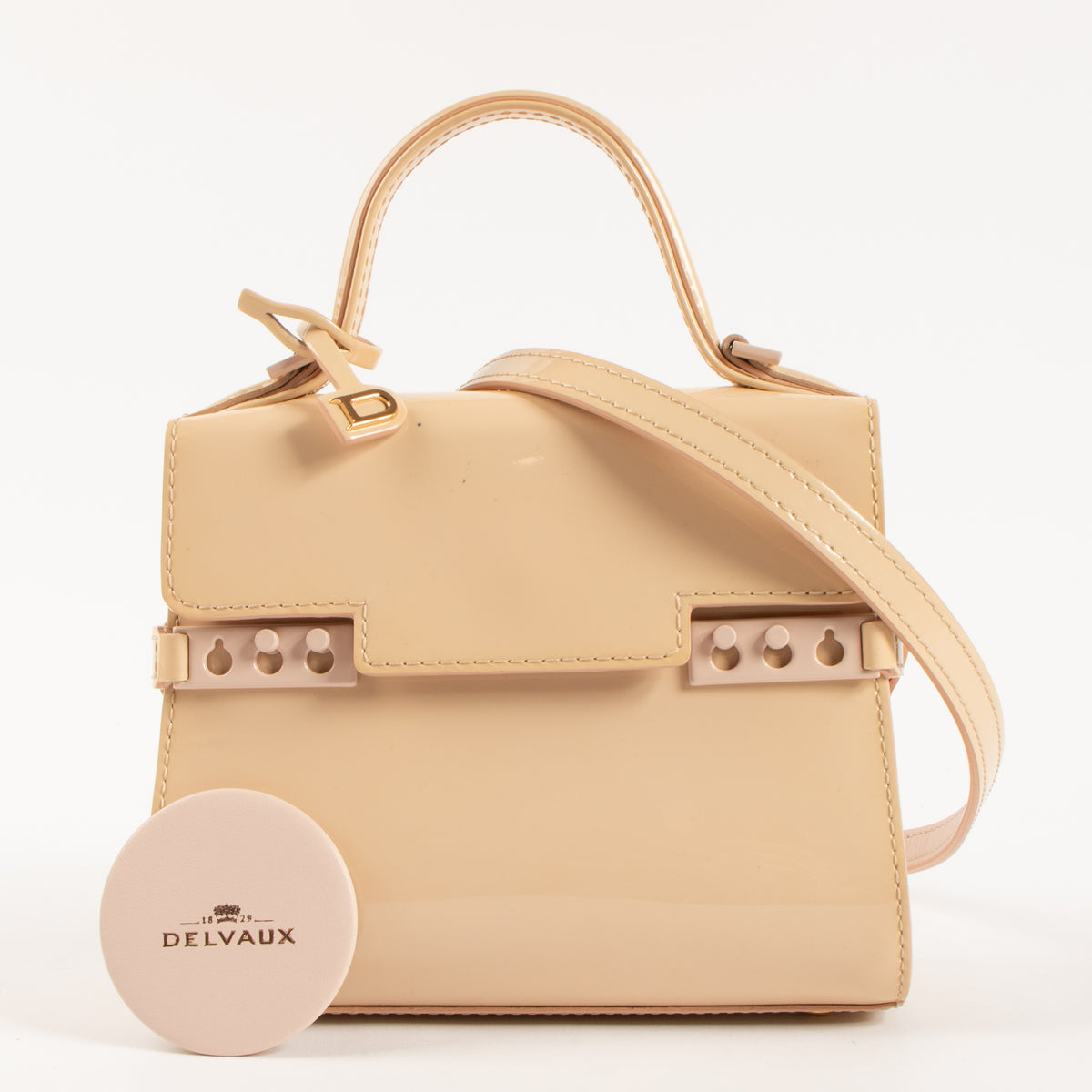 Shop the 100% authentic Delvaux Nude Vernis Tempête Micro Bag second hand on Labellov.com!