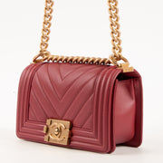 Shop this authentic luxury Chanel Framboise Calfskin Chevron Chanel Boy Small Bag Pre-Loved on Labellov.com