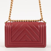 Shop this authentic luxury Chanel Framboise Calfskin Chevron Chanel Boy Small Bag Pre-Loved on Labellov.com