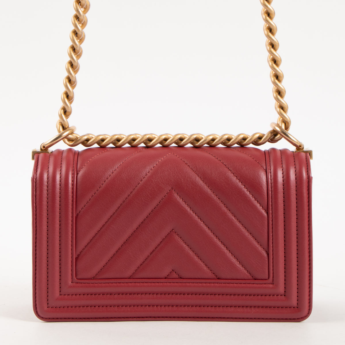 Shop this authentic luxury Chanel Framboise Calfskin Chevron Chanel Boy Small Bag Pre-Loved on Labellov.com