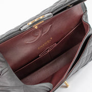 Shop this authentic Chanel Black Caviar Medium Classic 11.12 Handbag pre-loved on Labellov.com