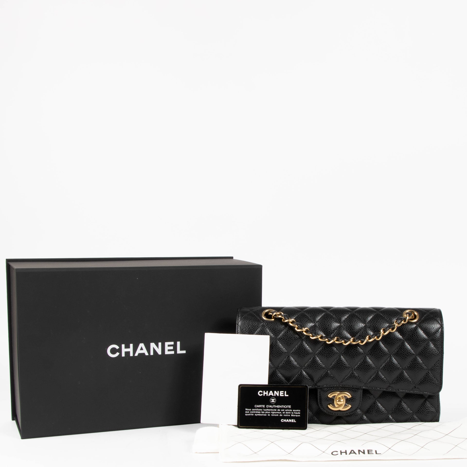 Shop this authentic Chanel Black Caviar Medium Classic 11.12 Handbag pre-loved on Labellov.com