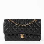 Shop this authentic Chanel Black Caviar Medium Classic 11.12 Handbag pre-loved on Labellov.com