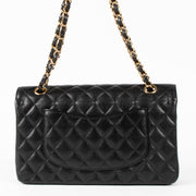 Shop this authentic Chanel Black Caviar Medium Classic 11.12 Handbag pre-loved on Labellov.com