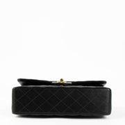 Shop this 100% authentic Chanel Black Lambskin Medium Classic 11.12 Double Flap Bag at Labellov.com