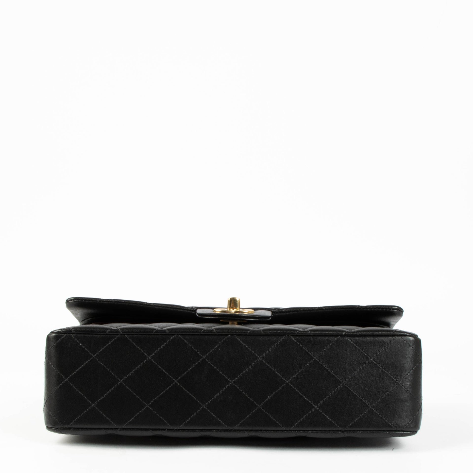 Shop this 100% authentic Chanel Black Lambskin Medium Classic 11.12 Double Flap Bag at Labellov.com