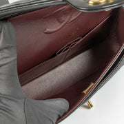 Shop this 100% authentic Chanel Black Lambskin Medium Classic 11.12 Double Flap Bag at Labellov.com