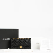 Shop this 100% authentic Chanel Black Lambskin Medium Classic 11.12 Double Flap Bag at Labellov.com