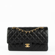 Shop this 100% authentic Chanel Black Lambskin Medium Classic 11.12 Double Flap Bag at Labellov.com