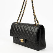 Shop this 100% authentic Chanel Black Lambskin Medium Classic 11.12 Double Flap Bag at Labellov.com
