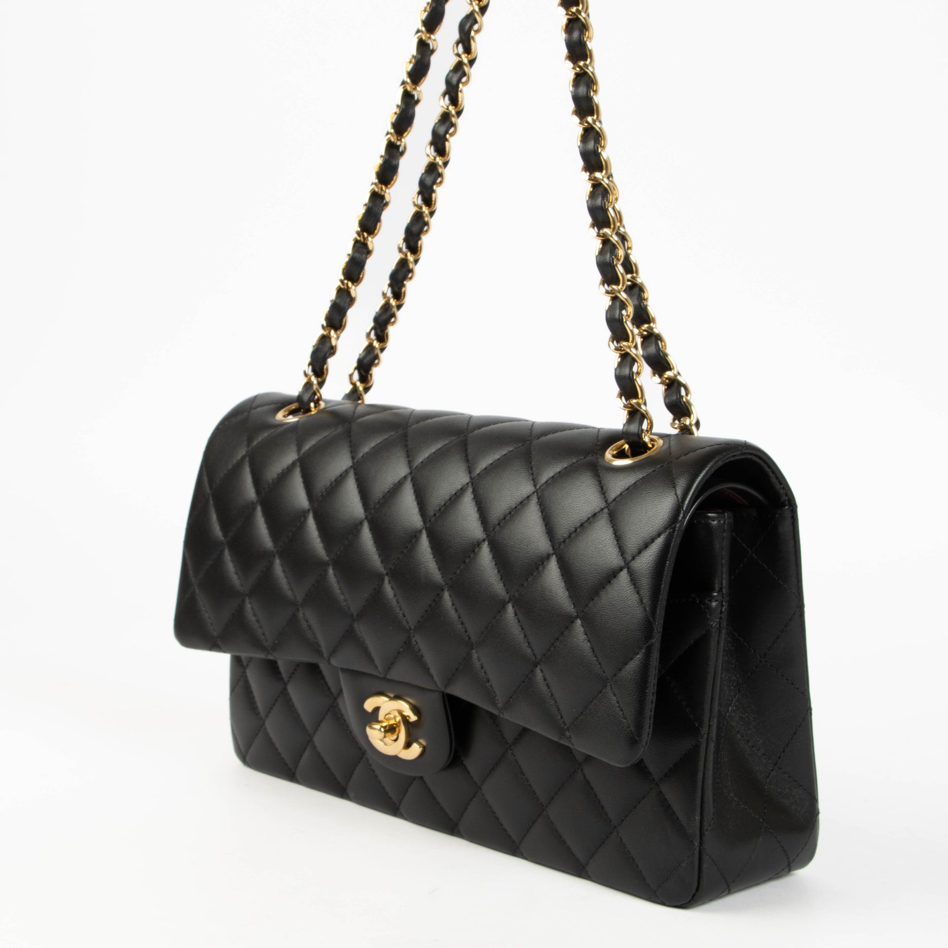 Shop this 100% authentic Chanel Black Lambskin Medium Classic 11.12 Double Flap Bag at Labellov.com