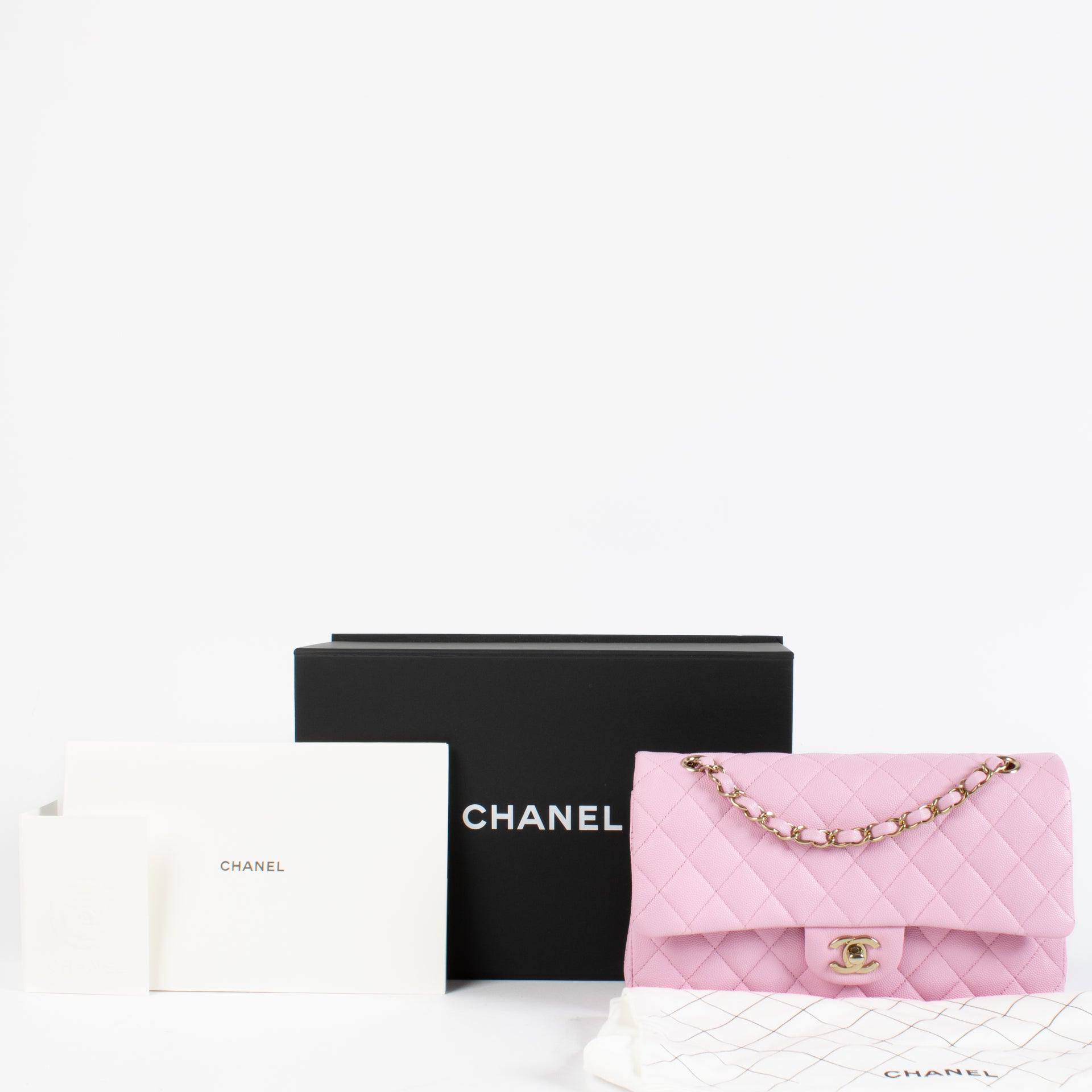 Sac Chanel Classic 11.12 moyen en cuir caviar rose