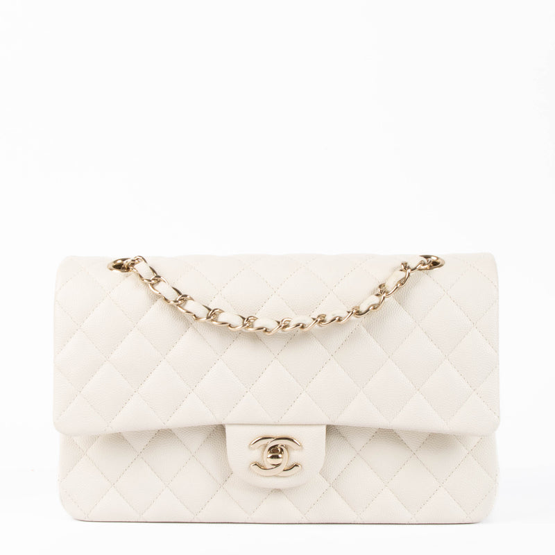 Shop the authentic Chanel Ecru Caviar Medium Classic 11.12 Shoulder Bag second hand on Labellov.com