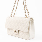 Shop the authentic Chanel Ecru Caviar Medium Classic 11.12 Shoulder Bag second hand on Labellov.com