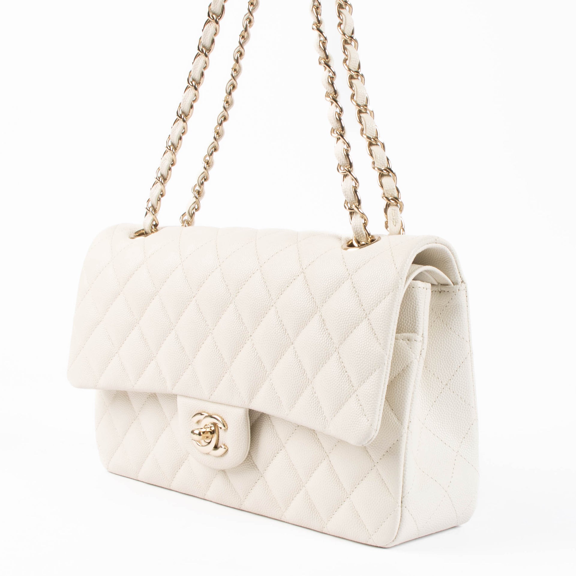 Shop the authentic Chanel Ecru Caviar Medium Classic 11.12 Shoulder Bag second hand on Labellov.com