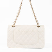 Shop the authentic Chanel Ecru Caviar Medium Classic 11.12 Shoulder Bag second hand on Labellov.com