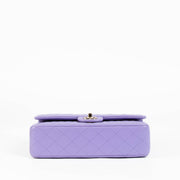Shop this 100% authentic Chanel Purple Caviar Medium Classic 11.12 Handbag at Labellov.com