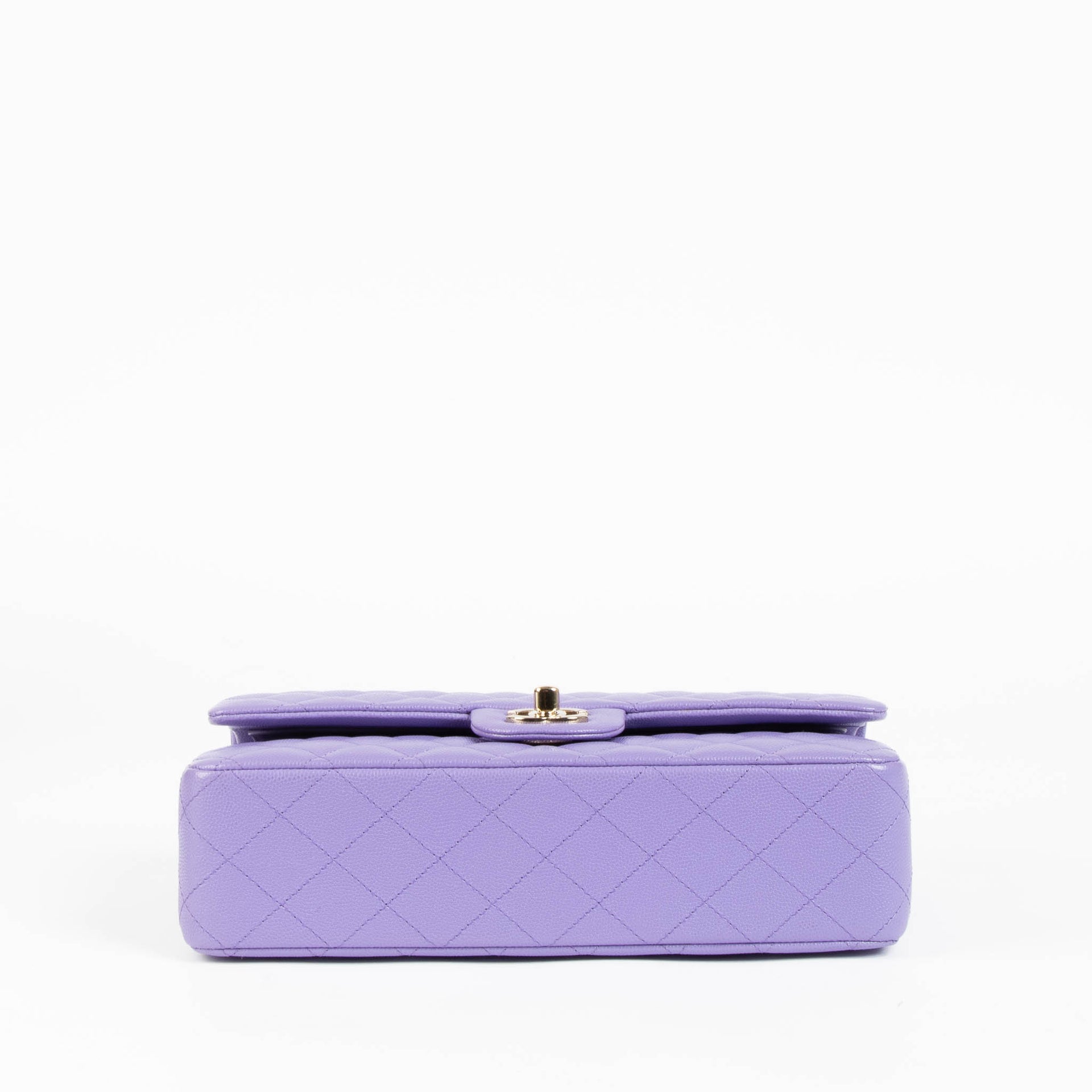 Shop this 100% authentic Chanel Purple Caviar Medium Classic 11.12 Handbag at Labellov.com