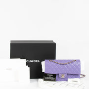 Shop this 100% authentic Chanel Purple Caviar Medium Classic 11.12 Handbag at Labellov.com