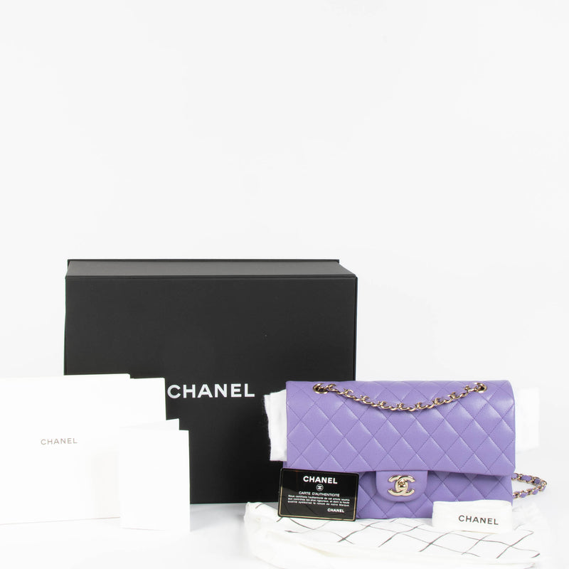 Shop this 100% authentic Chanel Purple Caviar Medium Classic 11.12 Handbag at Labellov.com