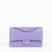 Shop this 100% authentic Chanel Purple Caviar Medium Classic 11.12 Handbag at Labellov.com